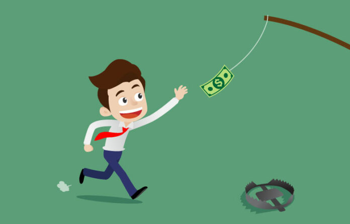 jemand läuft in eine Falle auf der Suche nach Geld